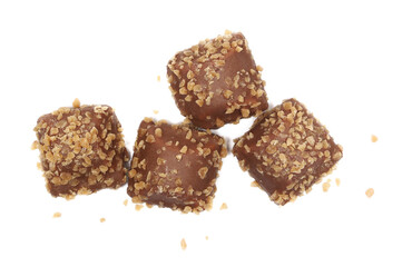 Caramel wafers, covered milk chocolate with caramel flakes isolated on white background, top view