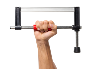 Hand holding a clamp isolated on transparent background, ready for construction