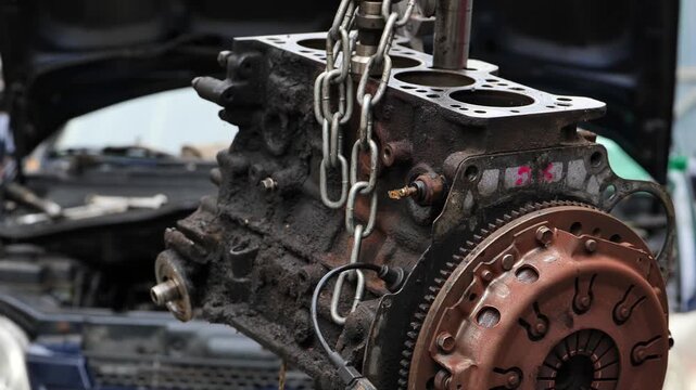 Car engine block lifting for garage repair service