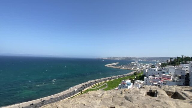 4K Panoramic video of a Beautiful view of Old vintage Kasbah buildings by the shore of Tangier the city of two oceans the Mediterranean and the Atlantic, Morocco
