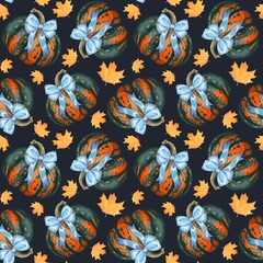 Fototapeta premium Hand drawn autumn seamless pattern with pumpkins, blue bows, autumn leaves. Watercolor on dark background.