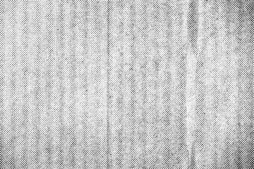 Seamless vintage distressed small halftone dot background pattern. Grunge black and white printer ink raster dots transparent texture overlay. Retro comic book print making creative concept backdrop.