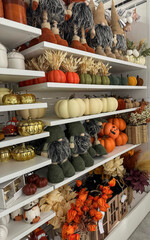 store shelves with autumn Halloween decor

