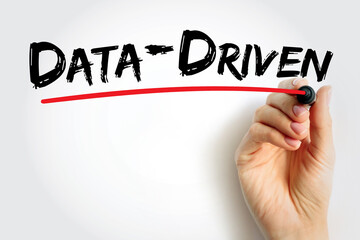 Data-Driven text handwritten by a person’s hand with red underline, illustrating analytical education decision-making, performance measurement, and evidence-based learning strategy