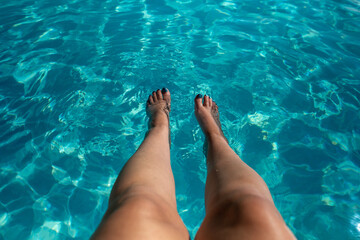 Feet in swimming pool 