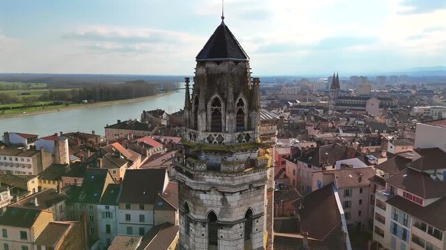 Drone shot of Saint Vincent Cathedral towers and Saone River in Macon