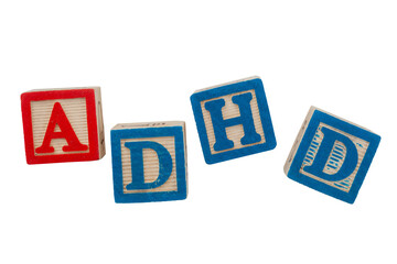 Group of wooden blocks spell out the word ADHD
