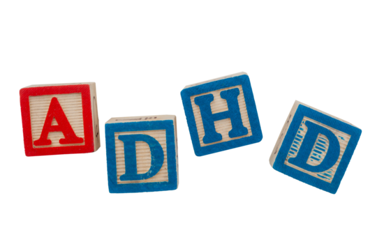 Group of wooden blocks spell out the word ADHD
