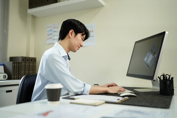 Fototapeta premium Business man, thinking and computer at desk in office for online research, reading email or report. Male entrepreneur person with internet connection for feedback, review and focus on project