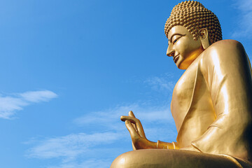 Golden Buddha statue statue big Buddha and sky