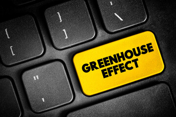 Fototapeta premium Greenhouse Effect is a process that occurs when energy from a planet's host star goes through its atmosphere and heats the planet's surface, text button on keyboard, concept background