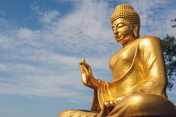 Golden Buddha statue statue big Buddha and sky