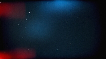 Dark abstract background with heavy vintage film grain, red and blue light leaks, dust, and scratches. Perfect for retro designs, cinematic overlays, photography effects, and grunge textures.