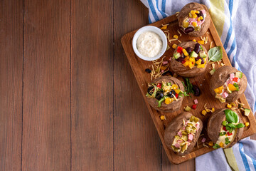 Homemade baked potato with toppings