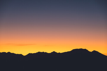 Mountain Silhouette at Sunrise from Isthmus Peak, Wanaka, New Zealand