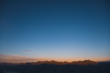 Alpenglow Sunrise on Mountain Peaks from Isthmus Peak, Wanaka, New Zealand