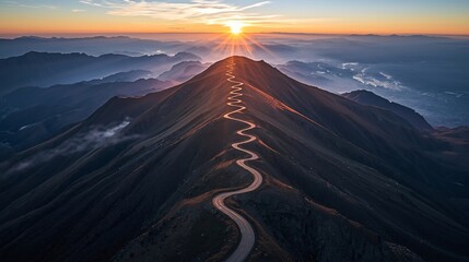 Winding Mountain Road at Sunrise – Dramatic Landscape, Journey Concept, Misty Horizon