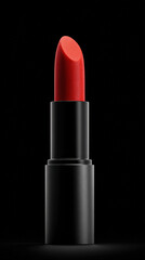 Obraz premium Vibrant red lipstick stands elegantly against black background, showcasing its smooth texture and luxurious appearance, perfect for enhancing beauty and confidence