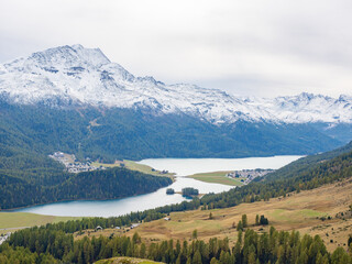 St. Moritz, Switzerland - October 6th 2024: View from Piz Nair biking ressort towards Silvaplana lake with mountains