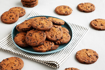 Homemade Chocolate Chip Cookies on a Plate, side view.