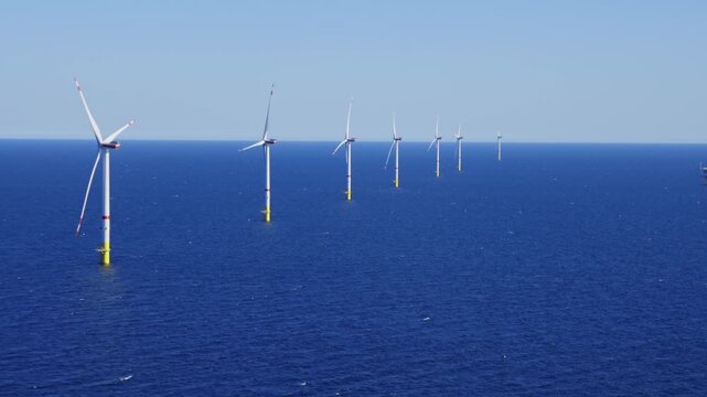 Video footage of offshore wind farm in the Baltic Sea taken from a helicopter.