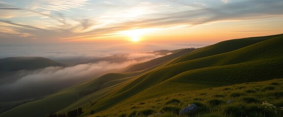 Fototapeta premium Misty sunrise paints rolling green hills, distant valley shrouded in fog, stock photo, hills