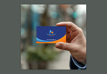 Editable Business Card in Hand Mockup.