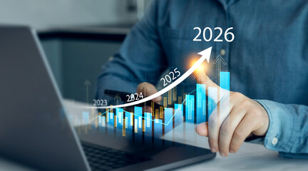Analyzing financial growth chart for 2026 year.Showing revenue increase, market trends, investment...