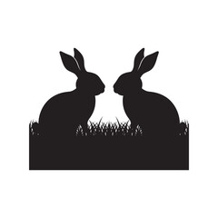 Silhouette of Two Rabbits Sitting on Grass