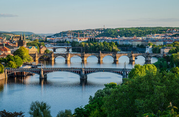 Close-up view of several bridges connecting parts of Old Town Prague, Czech Republic, illuminated by warm May evening sunlight- 2