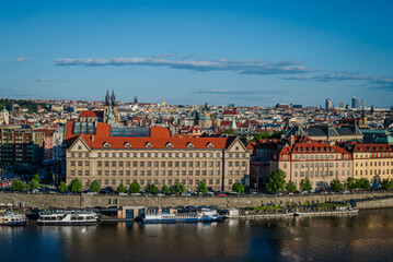 Prague Old Town along the Vltava River in May, bathed in soft evening light, Czech Republic