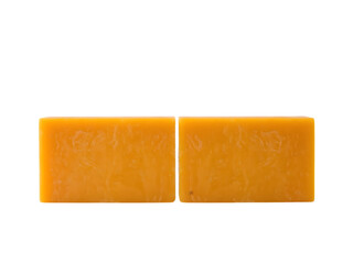 Yellow Soaps Duo: A pristine presentation of two rectangular bars of vibrant yellow soap. Their clean lines and smooth surfaces create a visual appeal.