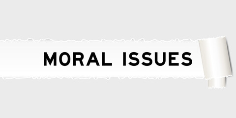 Ripped gray paper background that have word moral issues under torn part