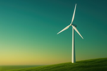 Fototapeta premium wind turbine on grassy hill at sunset with copy space