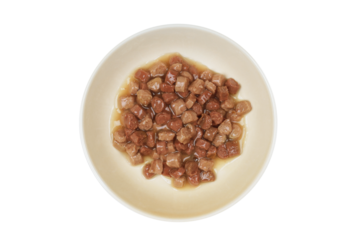 Wet cat food with gravy in a feeding bowl
