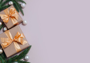 Festive New Year backdrop with gift boxes, fir branches, and ornaments, copy space