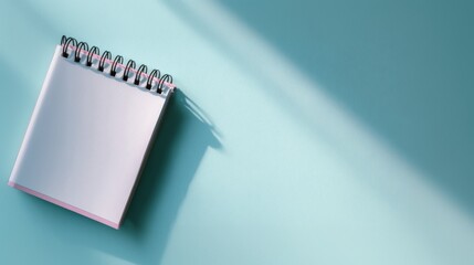 A Brand New Notebook as the Central Element in a Symbolic Still Life Arrangement, Embodying the Essence of an Office Concept, Perfect for Workspace, Study, and Creative Environment Visuals.