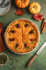 Pumpkin pie, Thanksgiving homemade crust tart, topped with pecan nuts and seeds