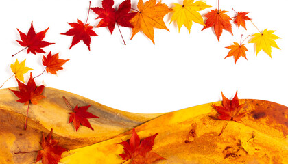 Autumn leaves falling in a gentle curve over golden hills
