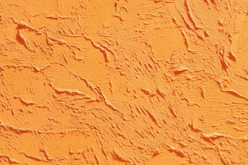 Textured orange surface with vibrant relief features, showcasing dynamic dips and peaks for an engaging visual appeal, radiating warmth and positivity in a striking hue