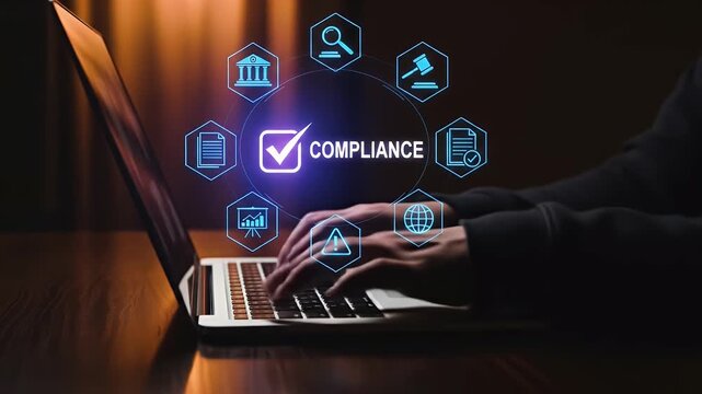 Compliance rules law regulation policy business. Businessman hold virtual compliance icons for enforcement of laws, regulations, and standards.
