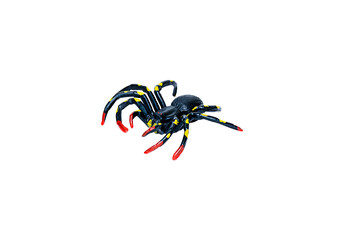 A black toy spider with yellow spots and red tips, shown at a slight angle. Isolated on a transparent background, excellent for Halloween, prank, or fear concepts