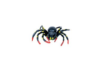 A menacing black toy spider with yellow spots and red tips, posed from a low, forward angle. Isolated on a transparent background for Halloween, prank, or fear concepts