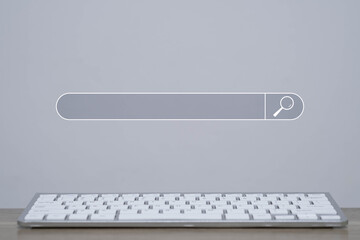 Search bar icon floating above keyboard represents online search, SEO, digital marketing, internet browsing, and web access ideal for content related to technology, search engines, and UX/UI design.