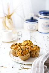 pumpkin muffins on a light background on a plate