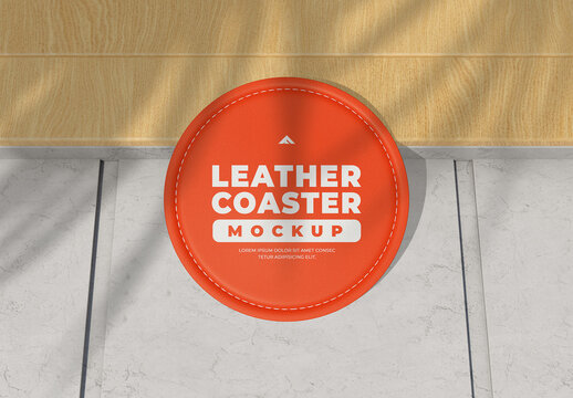Top-Down View of a Round Leather Coaster Mockup with Stitching and Shadow