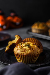 pumpkin muffins on a dark background