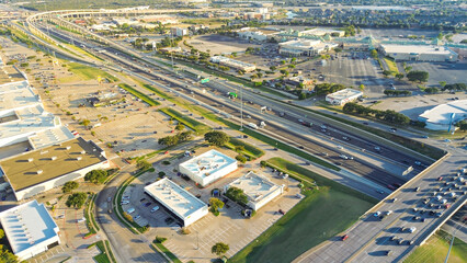 Stacked interchange viaduct highway in Lewisville, Texas featuring exit ramps, frontage roads,...
