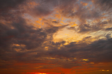 Sunset sky for background or sunrise sky and cloud at morning,Clouds and sky in the morning,Colorful morning sky and clouds backdrop,Beautiful Vivid sky painted by the sun leaving bright golden shades