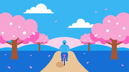 Person cycling through a park with blooming pink trees and falling petals